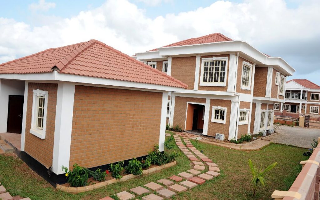 Beautiful houses in Nigeria A rooftop brick Style walls and white Windows