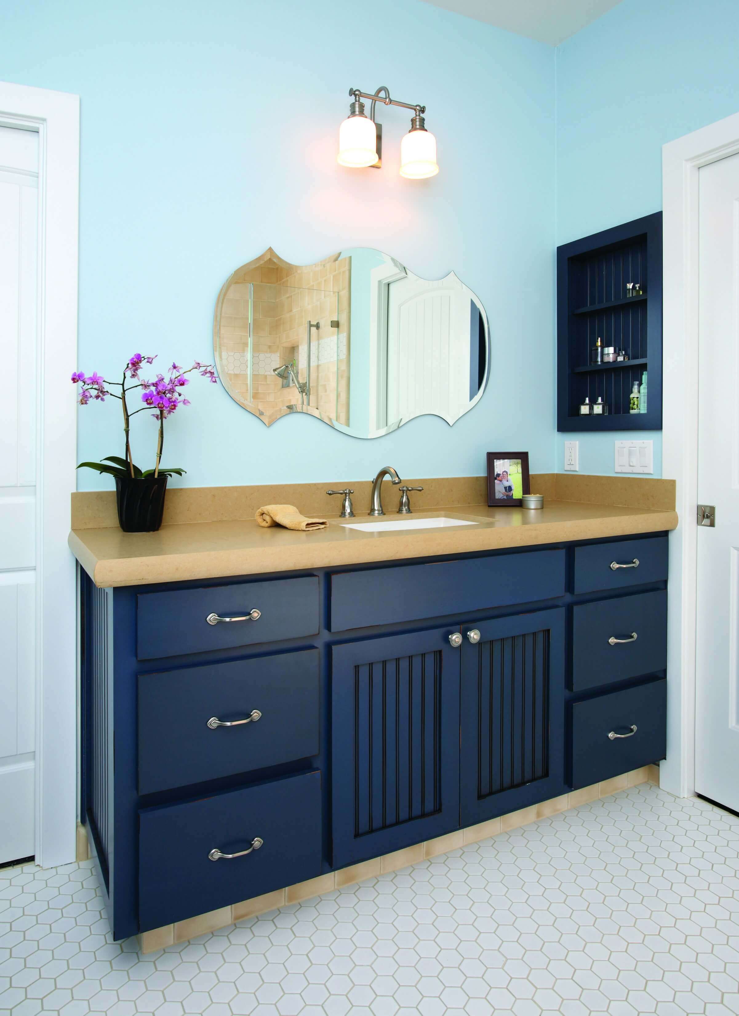 Blue Bathroom With Brown Vanity at carolejdeleon blog