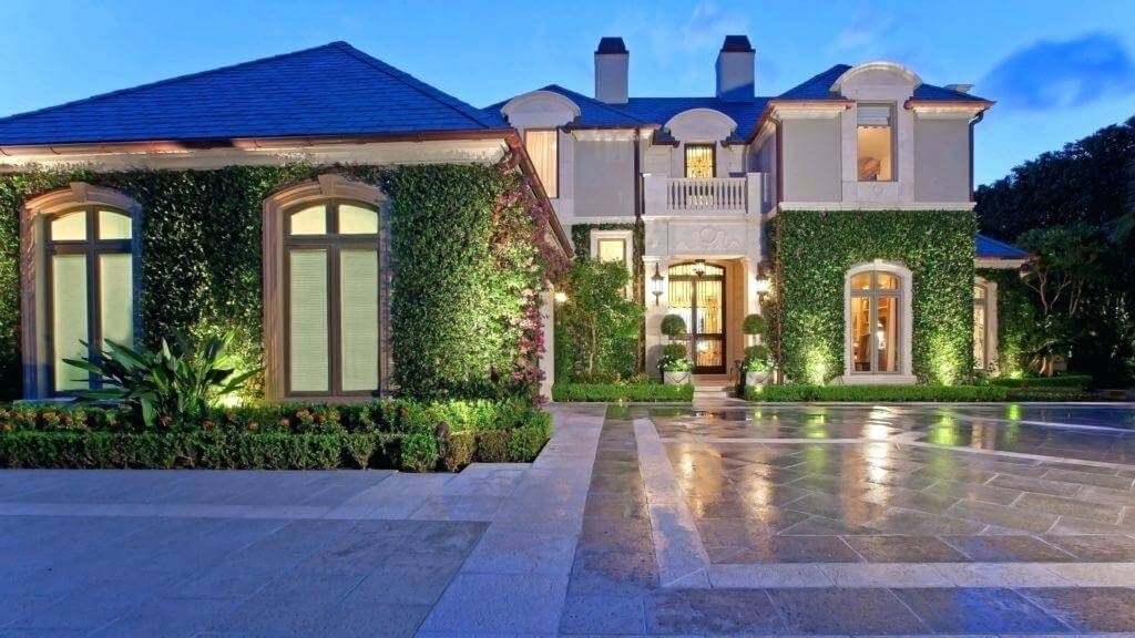 Beautiful houses in nigeria with grass on its wall during Nighttime and basic light