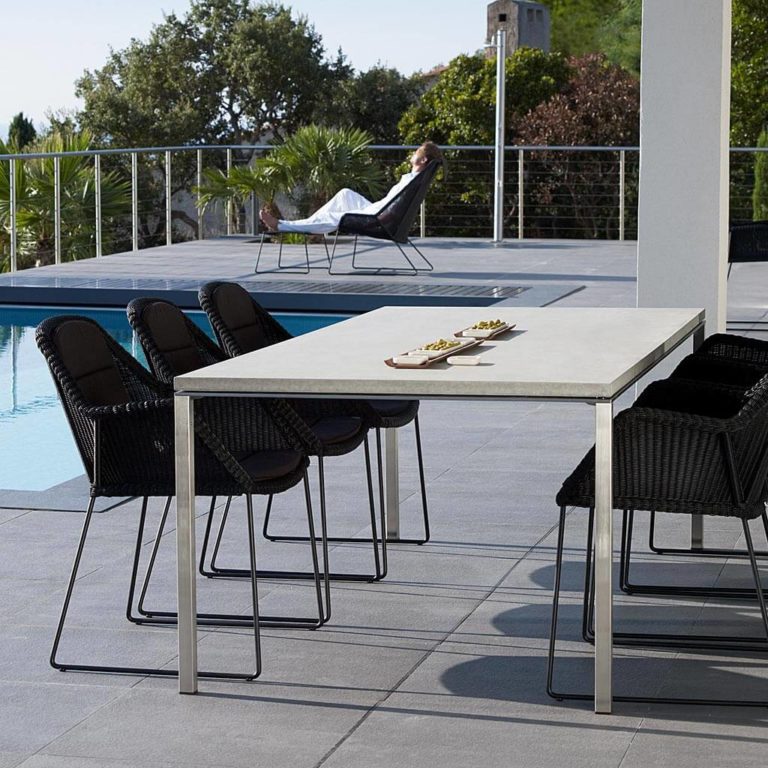 20+ Outdoor Dining Tables That Will Wow Your Dinner Guests