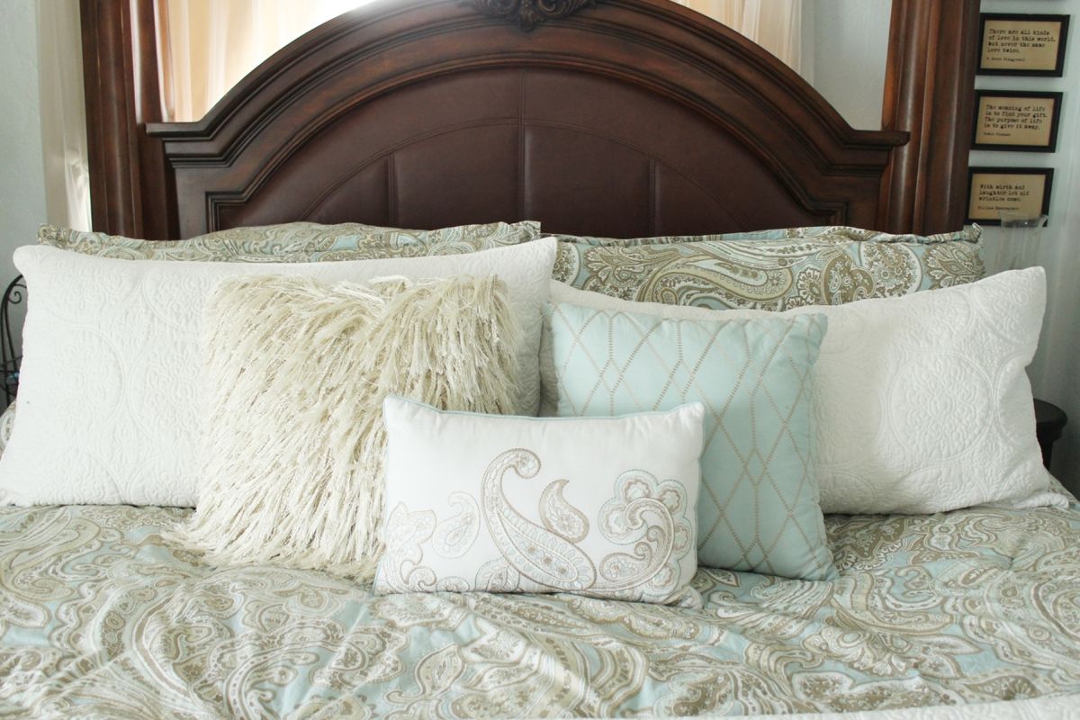 Arrange Pillow on a Bed