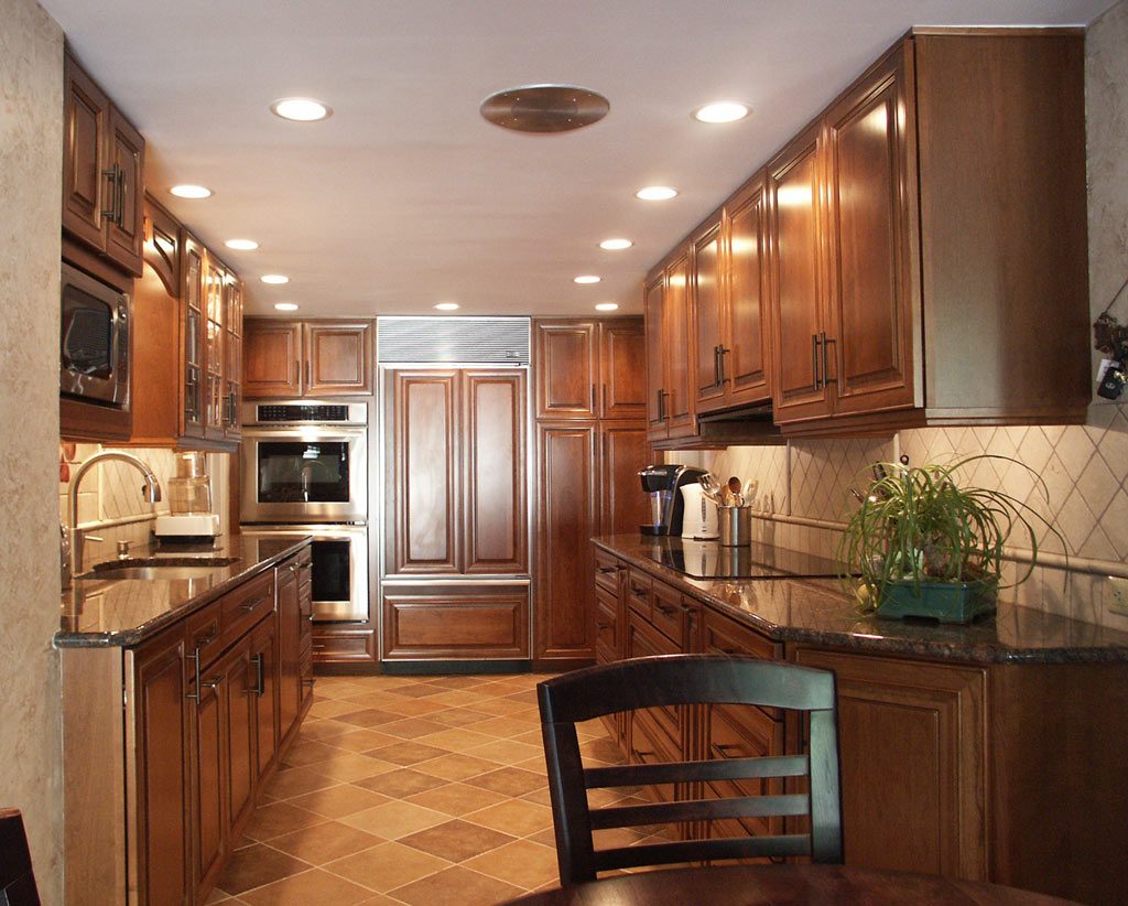 galley kitchen design with dark cabinet