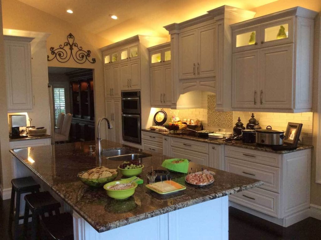 inexpensive lighting above kitchen cabinet