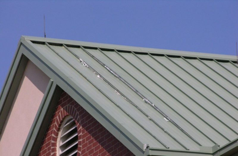 Lightning Rod on a Metal Roof 