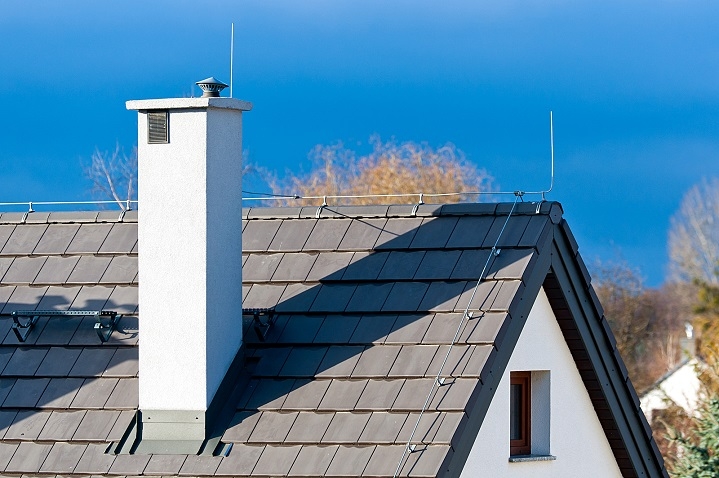 Lightning Rod on a Metal Roof 