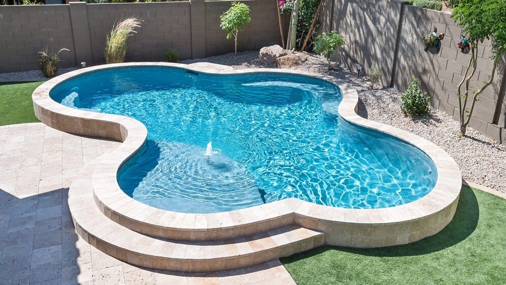 Cool Free Form Swimming Pool for Backyard with water Feature