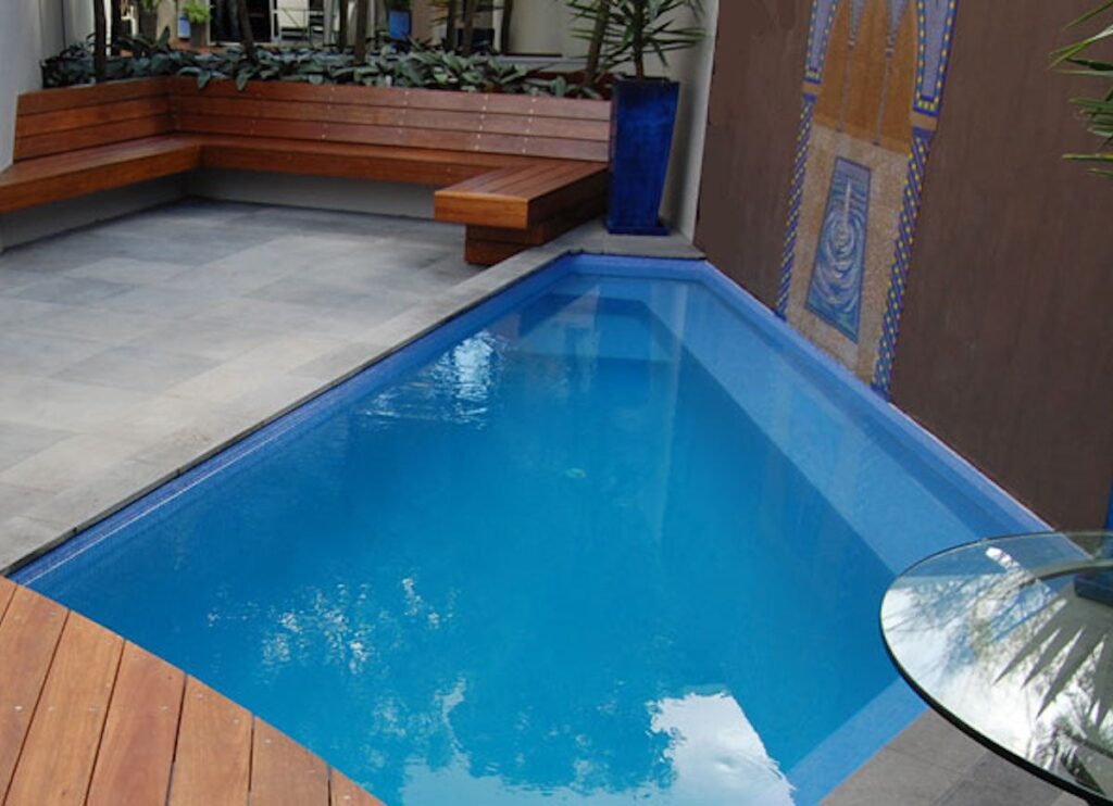 Small Unique Diamond Shape Backyard Pool with Sitting Area