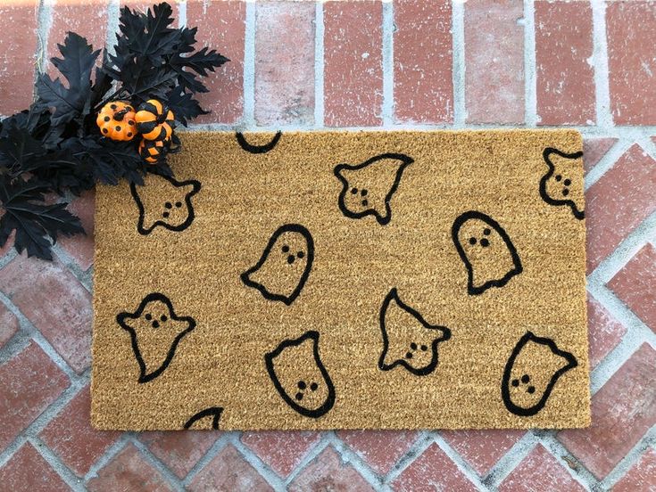 Halloween-Themed Doormats 