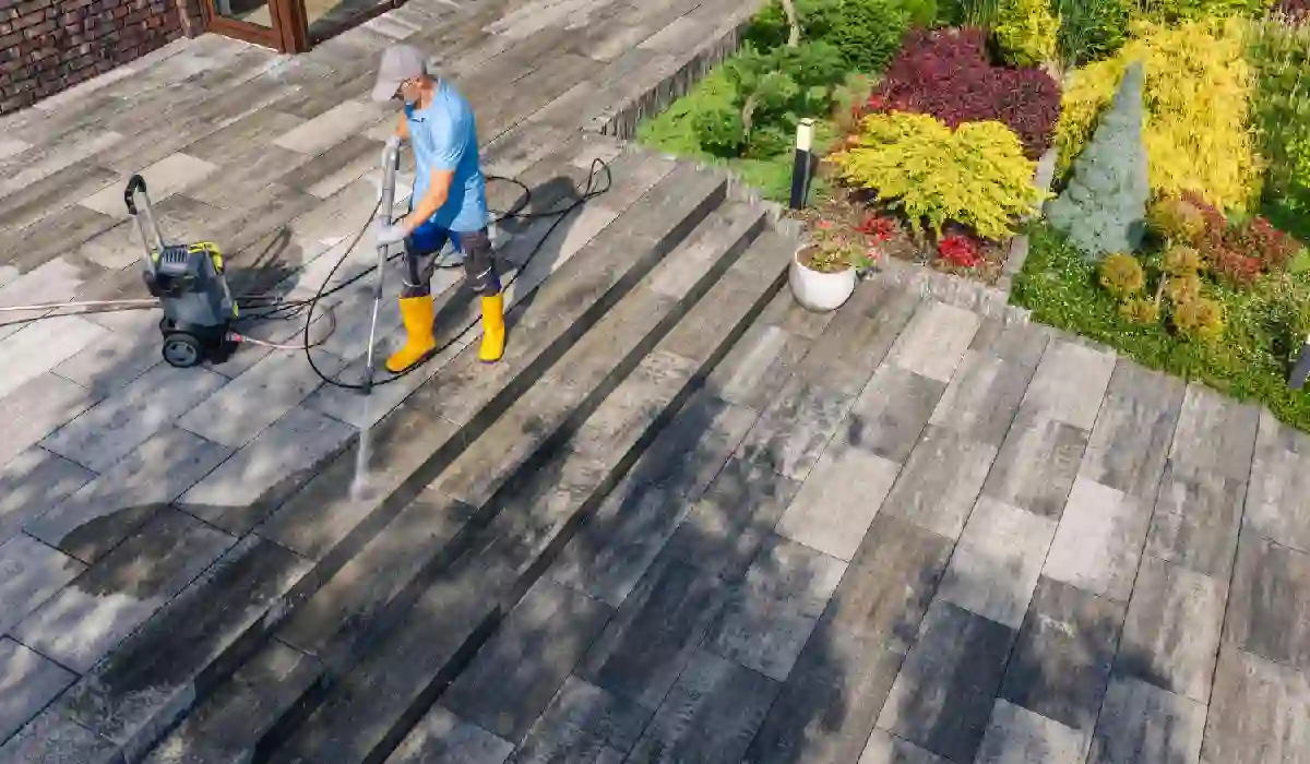 How to Remove Winter Salt Stains From Your Driveway “Removing winter salt stains from a concrete driveway using pressure washing cleaning method.”